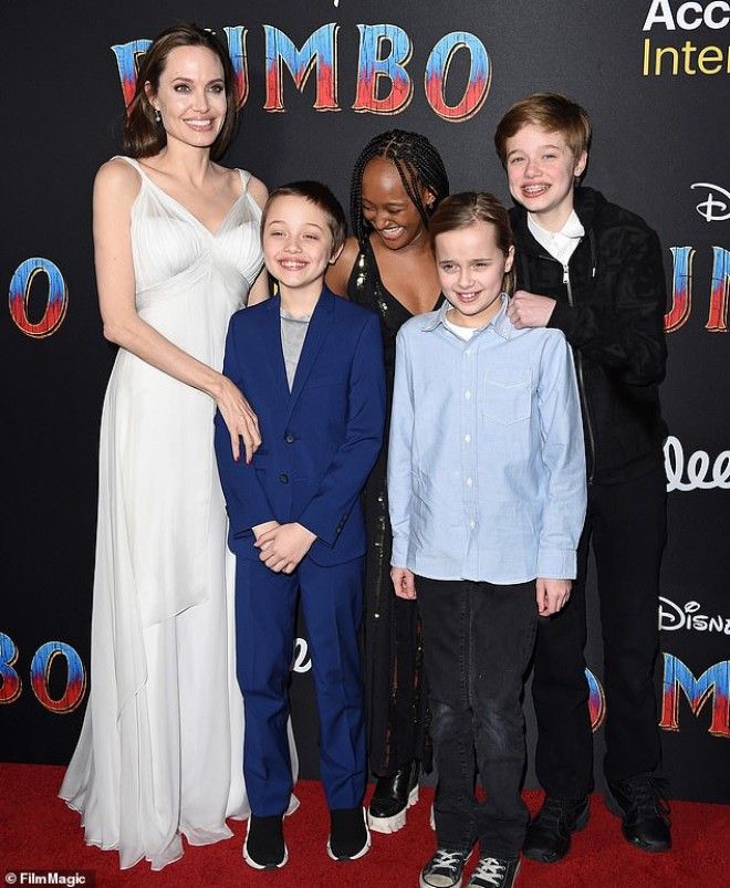 Showing support Angelina Jolie is a softie parents according to UsWeekly here she is seen at the Hollywood premiere of Dumbo with Vivienne and Knox as well as Shiloh and Zahara